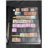 Image 1 : Album with 880 Assorted Worldwide Stamps in Uncle Paul Binder