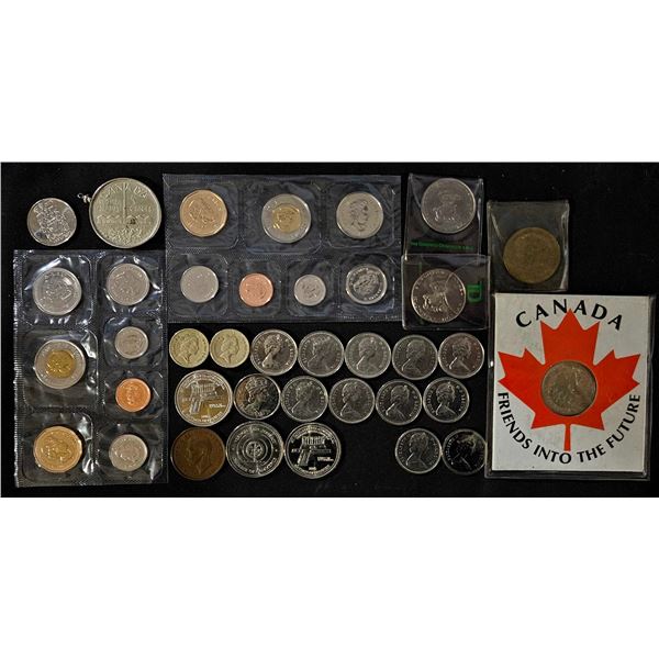 Canadian Coin Collection Including Klondike Dollars, Canadian Mint Sets, and Commemorative Tokens