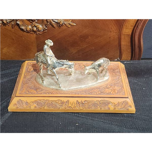 Jim Reno Western Cowboy and Calf Sculpture on Tooled Leather Base