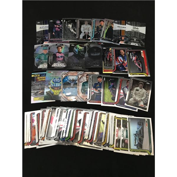 LOT OF MIXED RACING TRADING CARDS