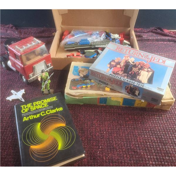 Toys and Collectibles Including Star Wars Puzzle, Ertl Truck, Lesney Plane, and Space Book