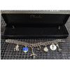 Image 1 : Charles Silver-Tone Charm Bracelet with Case and Seven Charms