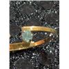 Image 2 : 10K Gold Gavon Stamped Ring with Light Blue Stone