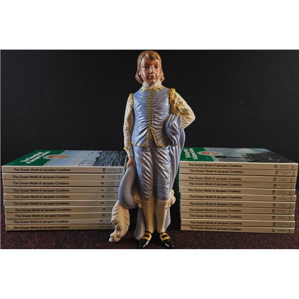 21 'The Ocean World of Jacques Cousteau' Books and Porcelain Boy Figurine