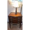 Image 1 : Wood Three-Drawer Side Table with Brass Pulls and Table Lamp