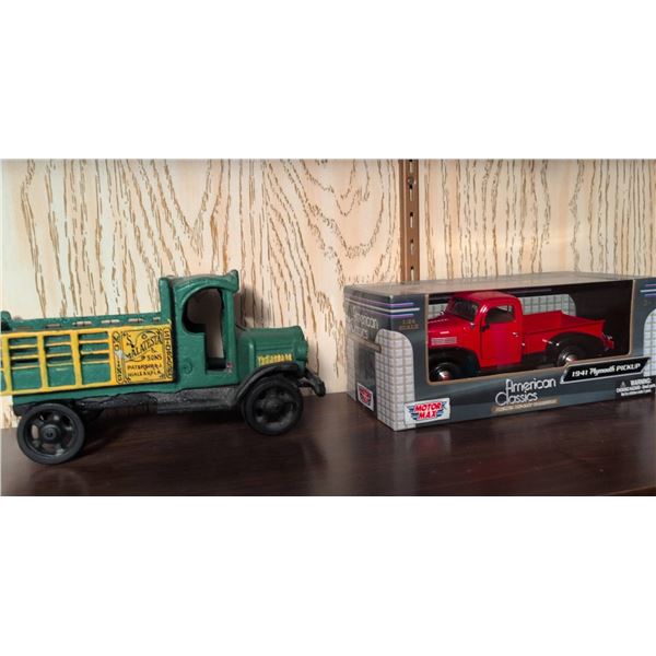 2 Die-Cast Vehicles: Motor Max 1941 Plymouth Pickup and Malatest & Sons Farm Truck