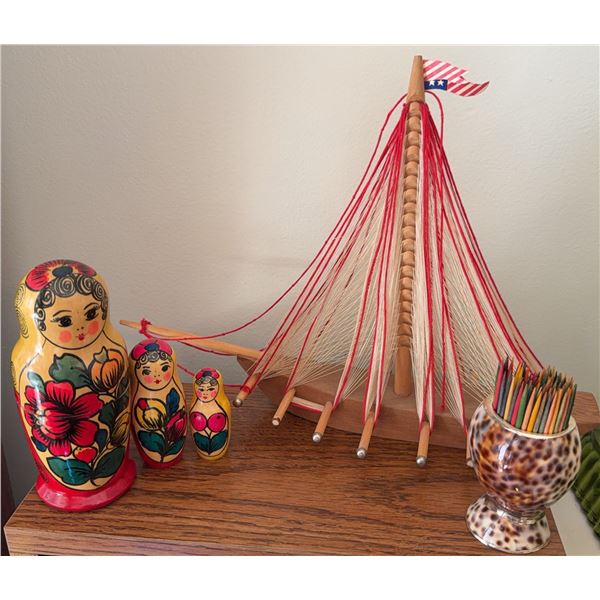 Russian Nesting Dolls, Shell Toothpick Holder, and Wooden Model Sailboat