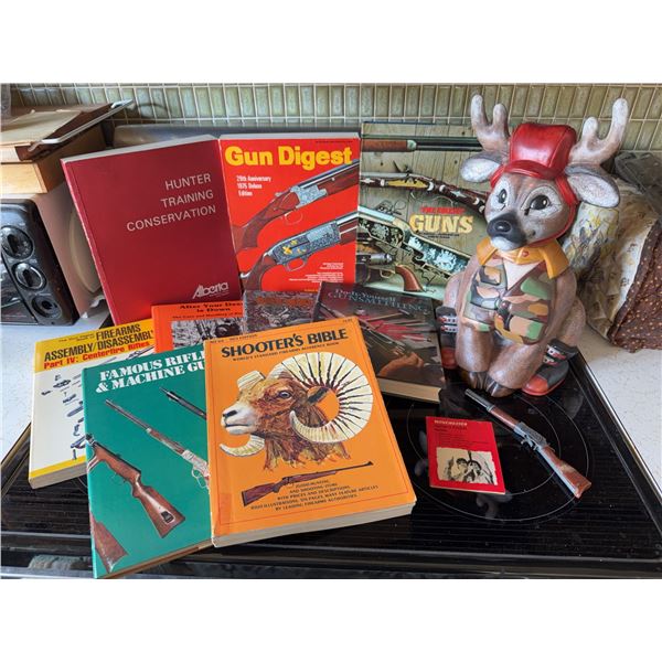 Hunting and Firearms Books with Deer Hunter Figurine