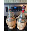 Image 2 : Cast Iron Pot Holders and Il Ruffino Vintage Wine Bottles