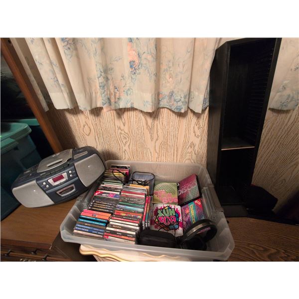 CD Music Collection with CD Player, Cassette Deck, and Storage Rack