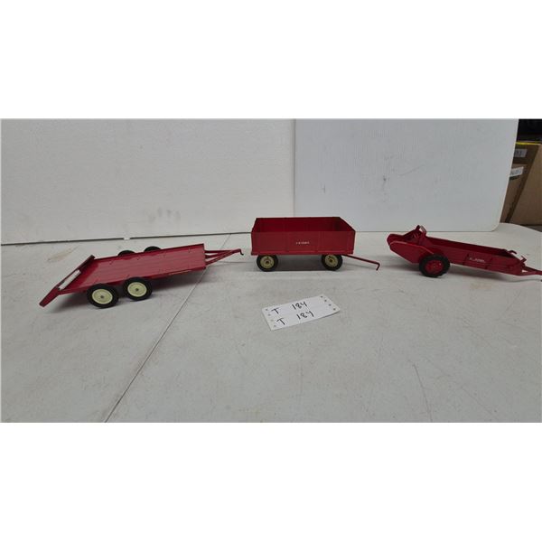 Ertl International Low Bed Trailer, McCormick Barge Wagon, and McCormick manure Spreader. Metal or