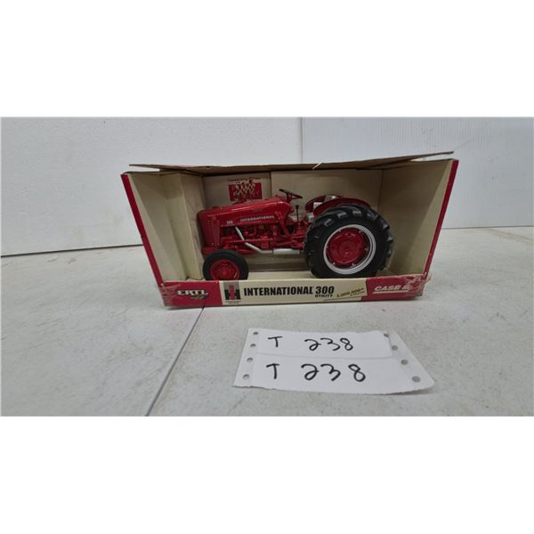 Ertl International Harvester 300 Utility 3,000,000th IH Tractor 1/16 Scale Die-Cast Model