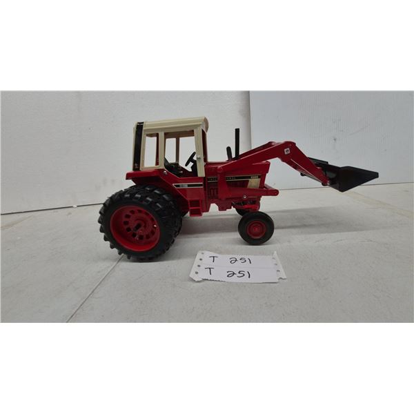 International Harvester 1586. Die-Cast Toy Tractor with Front-End Loader and Dual Rear Wheels