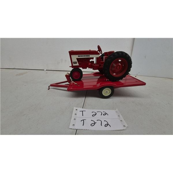 Farmall 404 Die-Cast Toy Tractor by International Harvester 1/16 Scale with metal Red. Tilt deck