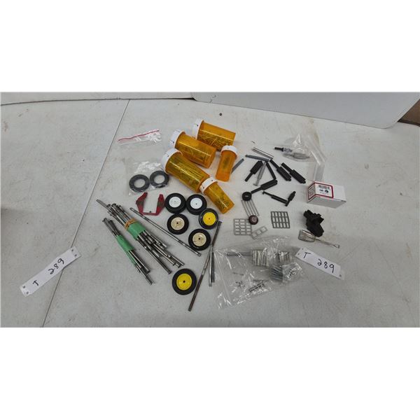 Assorted Die-Cast Tractor and Implement Parts: Wheels, Axles, Grills, Linkages, Mufflers