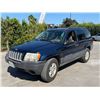 Image 1 : JEEP GRAND CHEROKEE 2004 T-DONATION