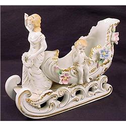 VINTAGE VICTORIAN STYLE FIGURINE OF LADY W/ SLEIGH