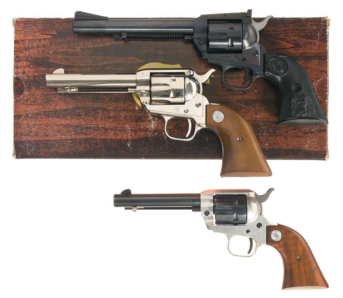 Three Colt Single Action Revolvers A) Colt New Frontier 22 Model