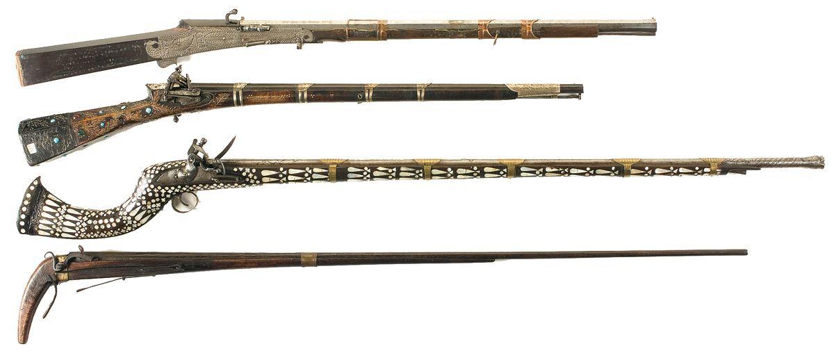 Four Antique Long Guns -A) Engraved Matchlock Musket B) Ornate Middle ...