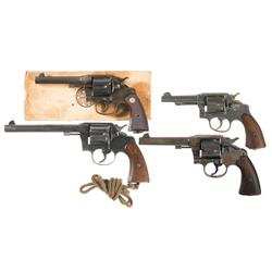 Four Double Action Revolvers -A) Colt U.S. Army Model 1917 Double Action Revolver  B) Colt New Servi
