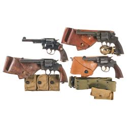 Four Double Action Revolvers -A) WWI U.S. Army 1917 Smith & Wesson Revolver  B) U.S. Colt Army Model