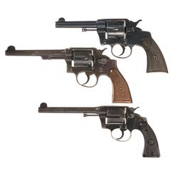 Three Double Action Revolvers -A) Colt Model 1896 Double Action Revolver  B) Smith & Wesson .38 Hand