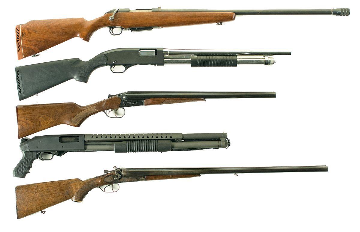 Five Shotguns A) Mossberg Model 395K Bolt Action Shotgun B) Winchester Model 1300 Stainless Marine