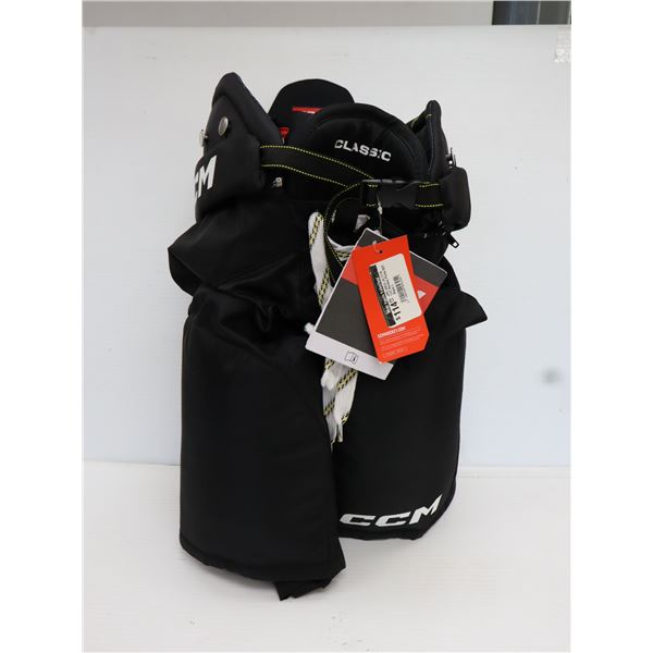 CCM TAC JUNIOR GRAND CULOTTES DE HOCKEY -NOIR