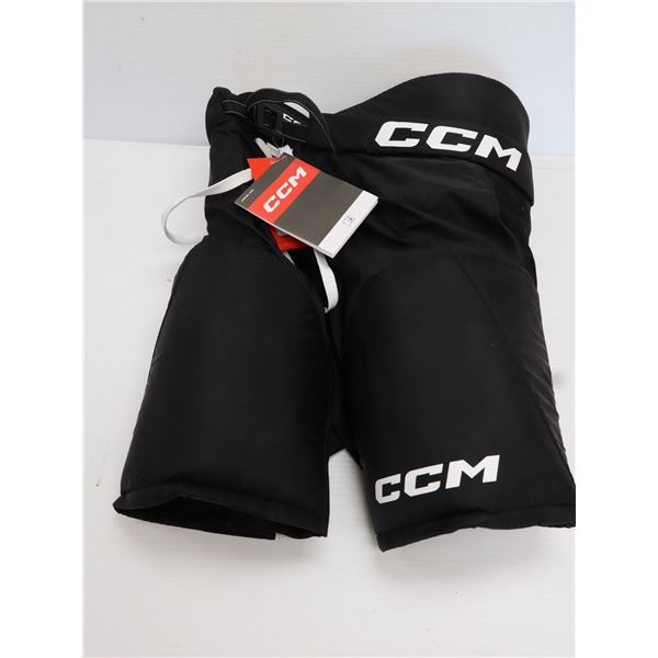 CCM NEXT23 JUNIOR GRAND CULOTTES DE HOCKEY -NOIR