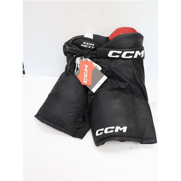 CCM NEXT JUNIOR PETIT CULOTTES DE HOCKEY -NOIR