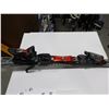 Image 2 : *USAGÉ* ATOMIC SKIS ALPINS 66" AVEC FIXATIONS ET BÂTONS