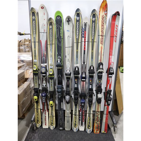 LOT OF 10 ASSORTED *USED* ALPINE SKIS WITH BINDINGS