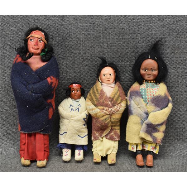 FOUR SKOOKUM DOLLS