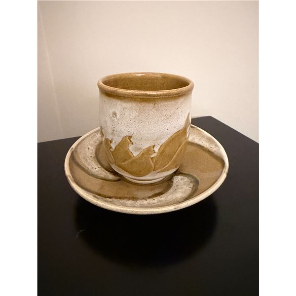 Pottery cup and saucer