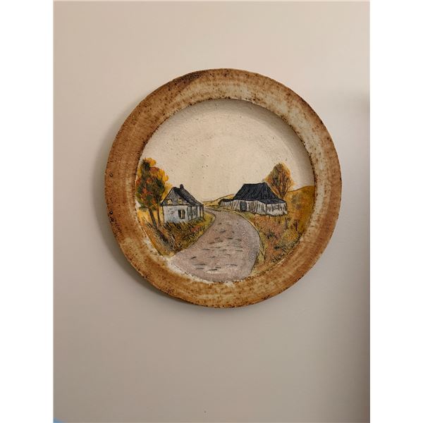 Signed pottery wall hanging