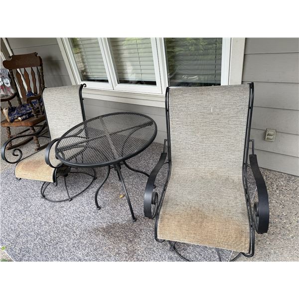 Patio table and two swivel chairs