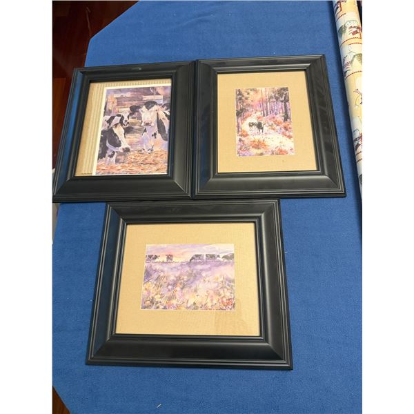 Three artwork featuring cows