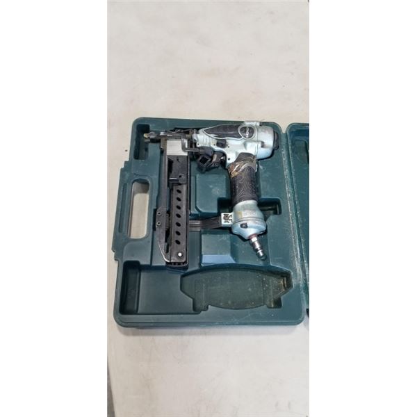CASED HITACHI AIR STAPLER, WORKING