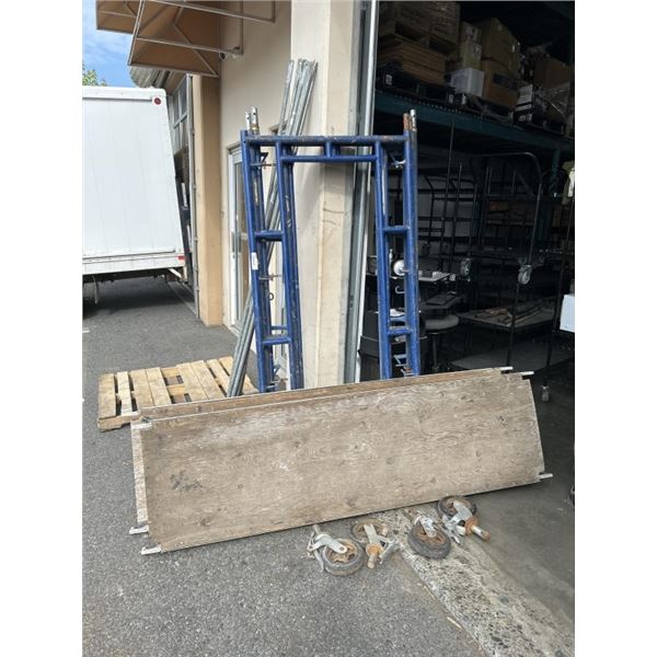 4 SCAFFOLDING UPRIGHTS, 4 CROSSBEAMS AND 2 SCAFFOLDING PLANKS.  BEAMS 99" LENGTH. UPRIGHTS ARE 78" X