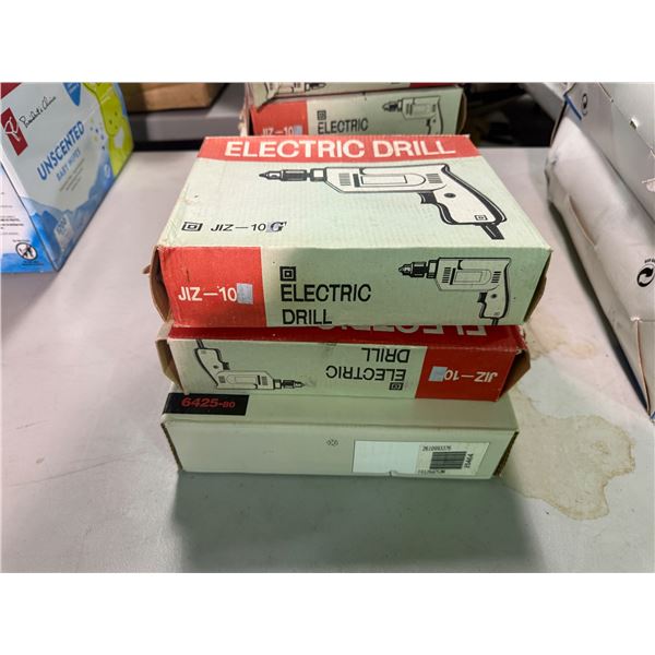 Group of 3 new in box 10mm Elctric Drill & Skil 10mm Impact Drill