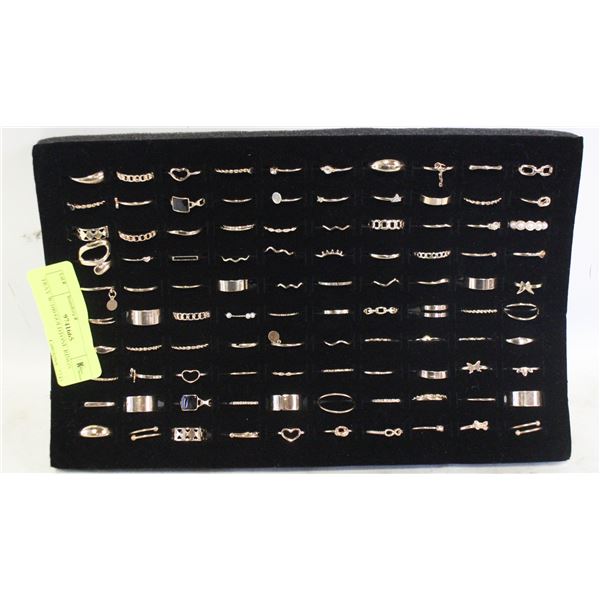 TRAY W/100 GOLDTONE RINGS