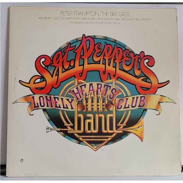 7)  PRE-OWNED "SGT. PEPPER'S LONELY