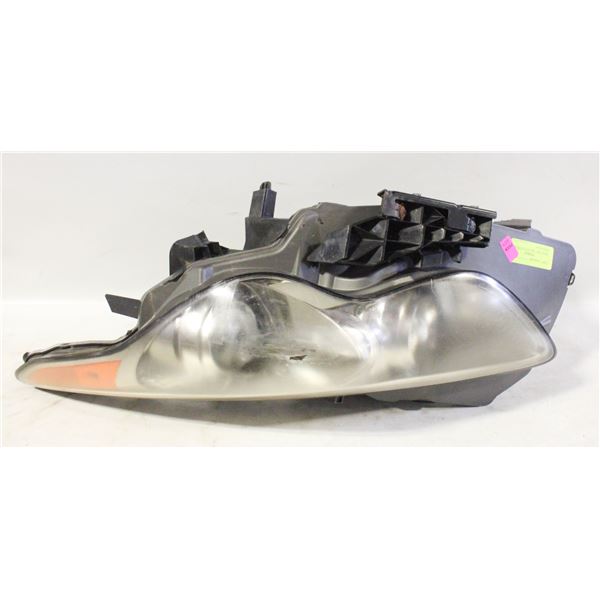 DRIVE SIDE  2009 INFINITI FX50 HEAD LIGHT