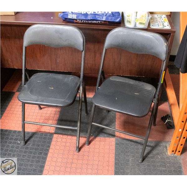 2 FOLDING BLACK CHAIRS - MINOR SURFACE DAMAGE