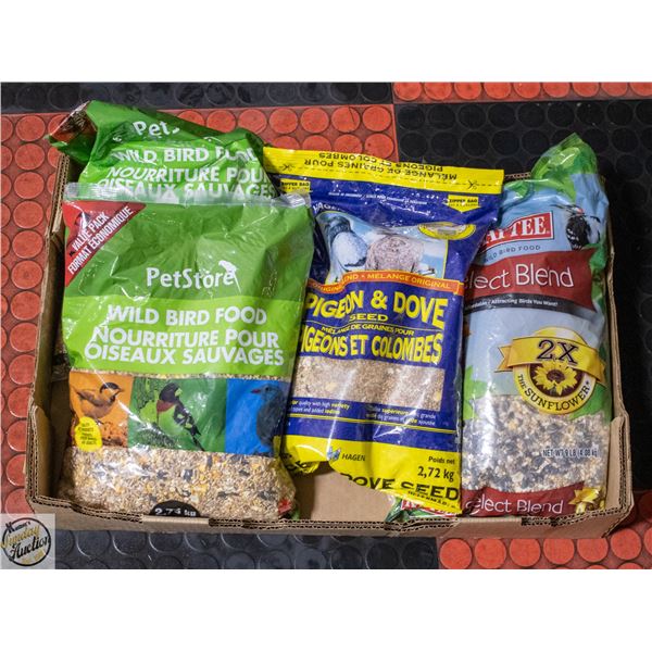 4 BAGS OF ASSORTED BIRD SEED