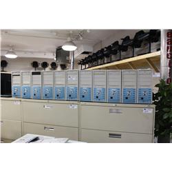 Large Lot Of Computer Equipment On Top Of File