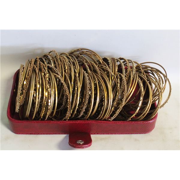 LOT OF GOLD COLORED BANGLES