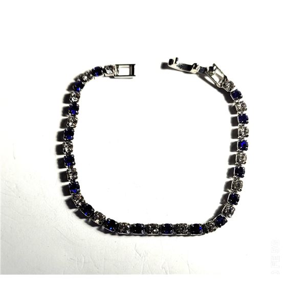 3)  SILVER TONE TENNIS BRACELET WITH