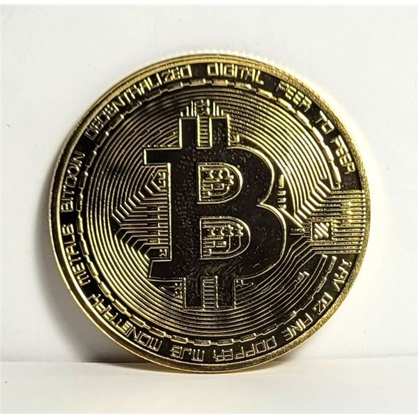 17)  GOLD TONE BIT COIN TOKEN.