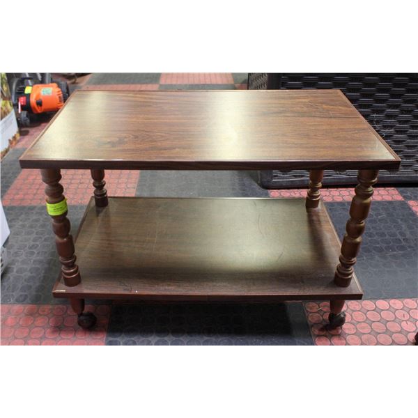 VINTAGE CASTOR WHEEL TV STAND 18"X26"